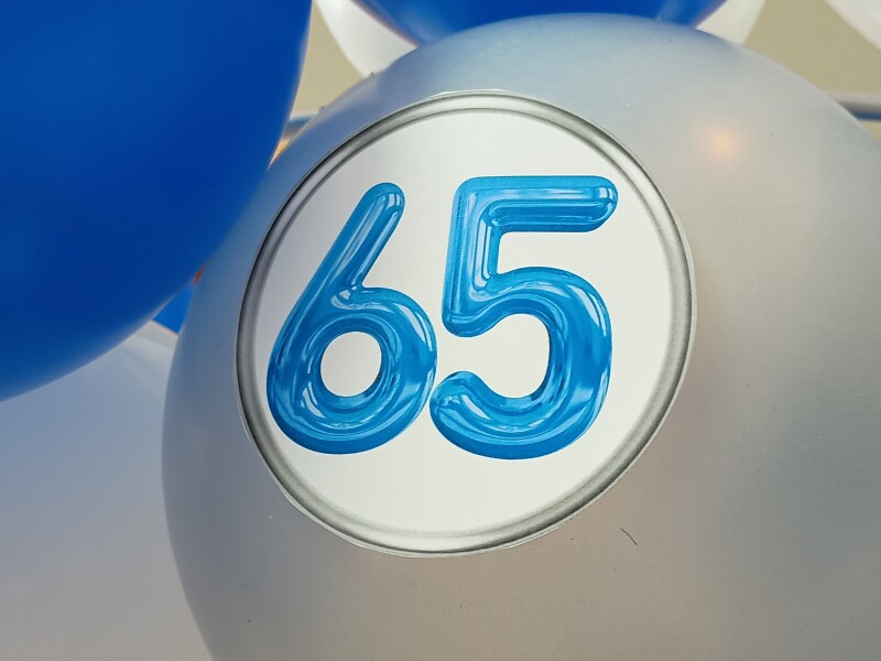 Re&uuml;nie De Piramide 65 jaar